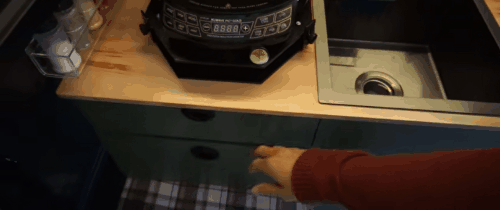 Opening and closing drawer with slam latch